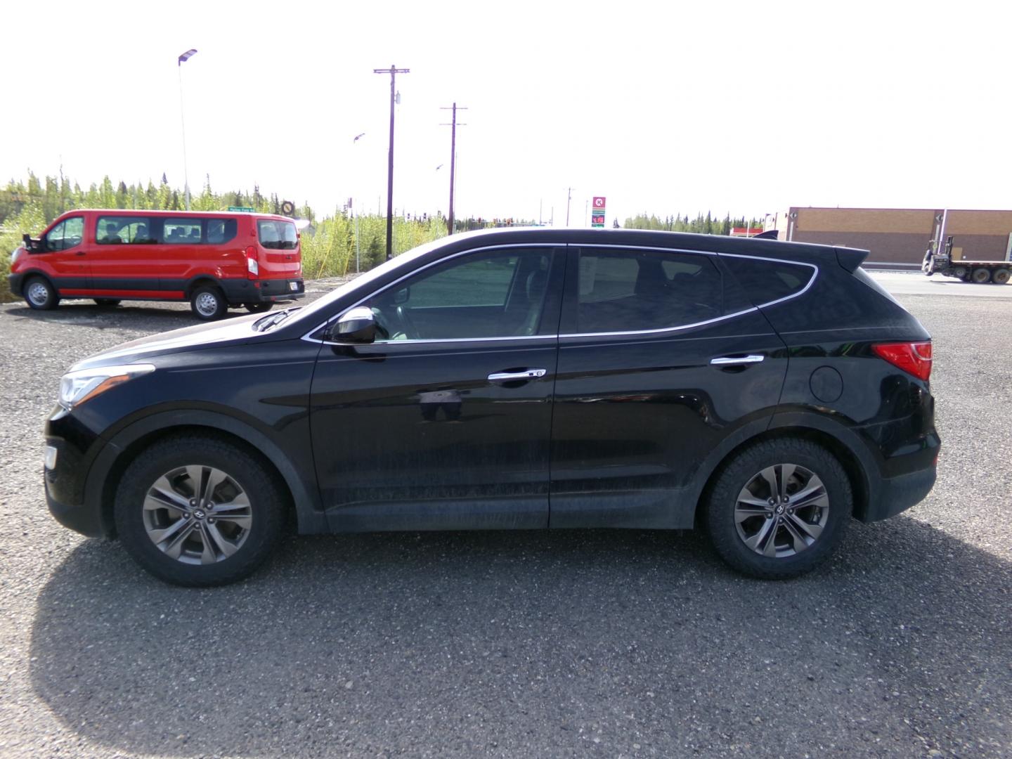 2013 Black Hyundai Santa Fe Sport 2.4 FWD (5XYZU3LB9DG) with an 2.4L L4 DOHC 16V engine, 6-Speed Automatic transmission, located at 2630 Philips Field Rd., Fairbanks, AK, 99709, (907) 458-0593, 64.848068, -147.780609 - Photo#2